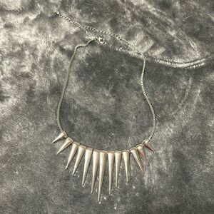 Silver tone spike icicle statement necklace